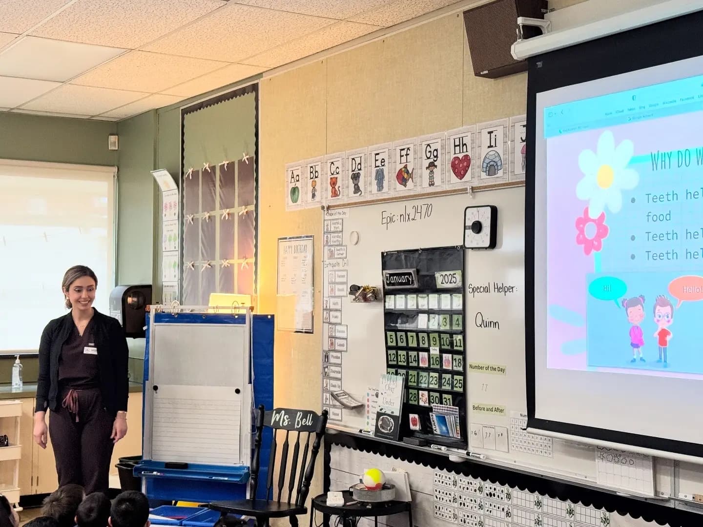 Dr. Ghazvini teaching local school children about dental health in Langley, BC
